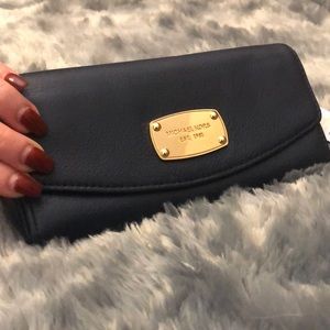 Slim flap Michael Kors leather wallet